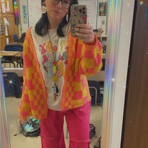 Orange and Pink sweater. Worn just a handful of times. Thick and comfy!